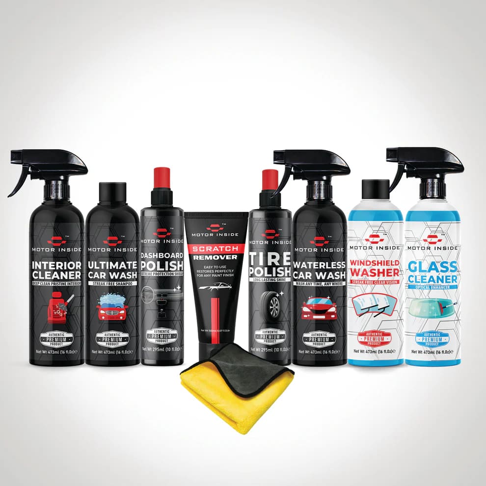Collection of car care products including sprays and a towel.