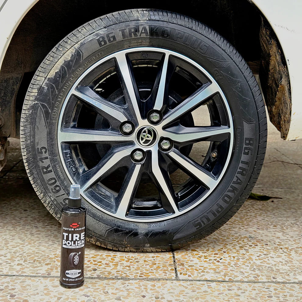 Car tire showing side-by-side comparison before and after applying tire polish, highlighting the restored shine and black finish